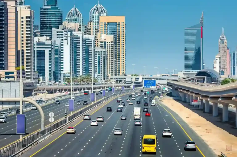 aerial-view-famous-sheikh-zayed-road-with-heavy-traffic-metro-rails-numerous-skyscrapers-dubai-marina-area-Ultimate guide to UAE traffic fines 2025